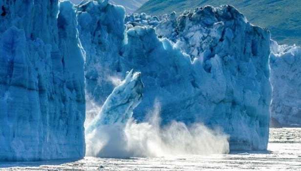 Calving glacier alaska hubbard glacier a huge iceberg calves into picture id1061549950 2